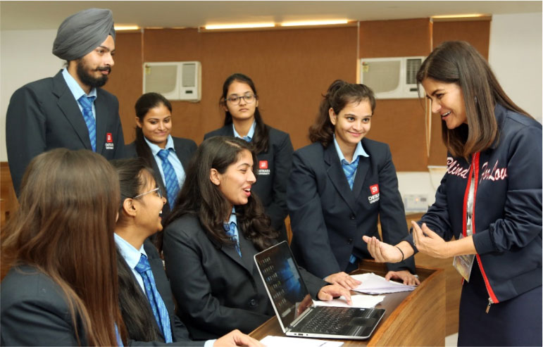 The illustration shows the mba students of chitkara university.