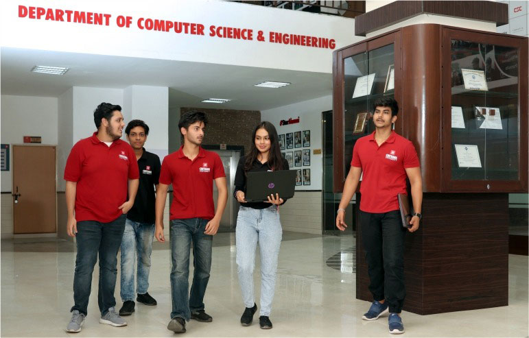 The illustration shows a student of chitkara university walking in the computer science and engineering department.