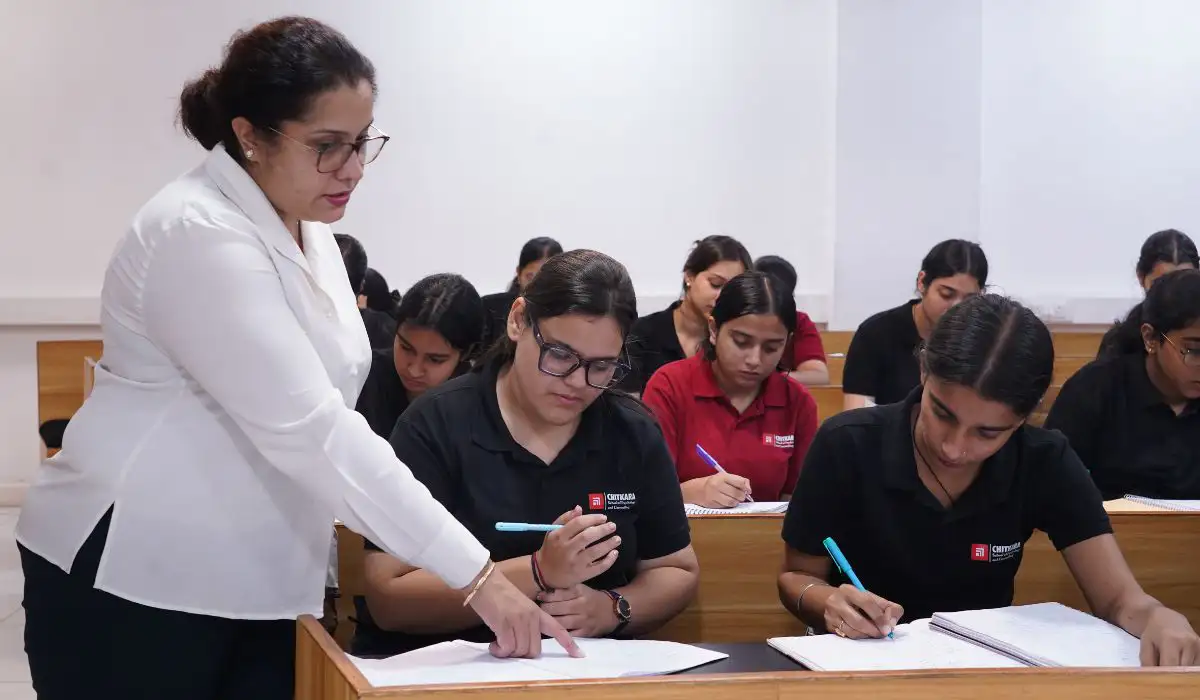 Chitkara University faculty guiding a student exploring future proof careers in the classroom