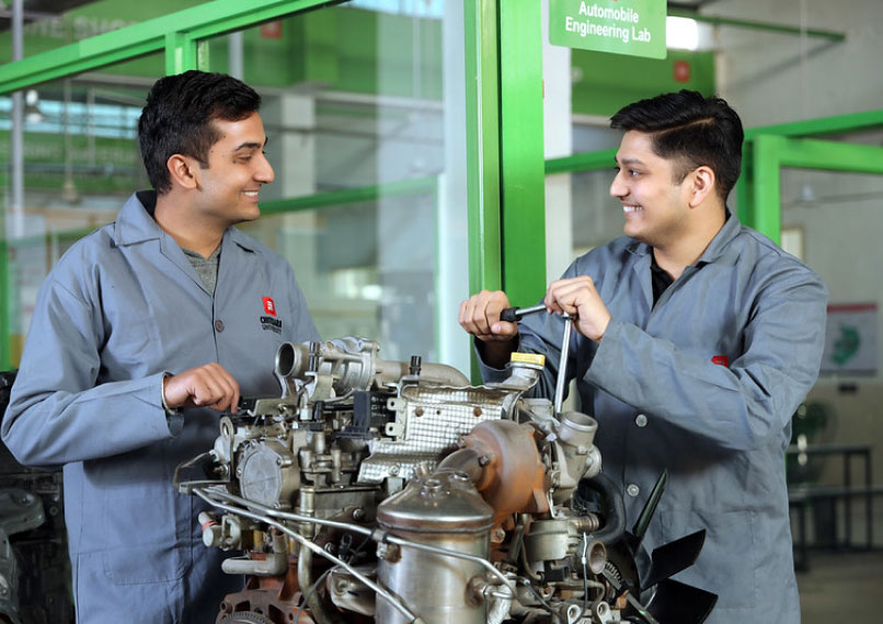Automobile engineering students preparing for careers in EV and automotive industry
