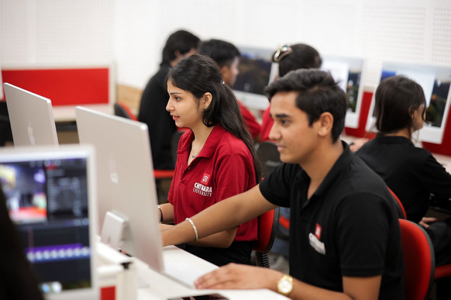 BCA with AI & ML students coding on system