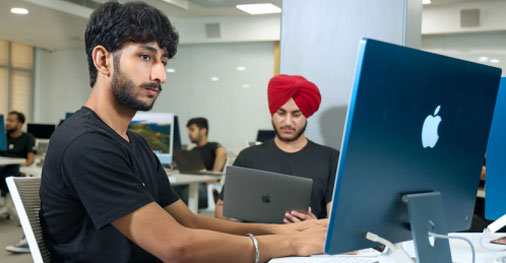 Students working on cloud-based AI applications in B.E. CSE with AI & Machine Learning program