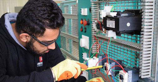 Students performing electrical circuit experiments in B.E. Electrical Engineering at Chitkara University