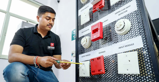 Student working on electrical engineering setup and practical experiment
