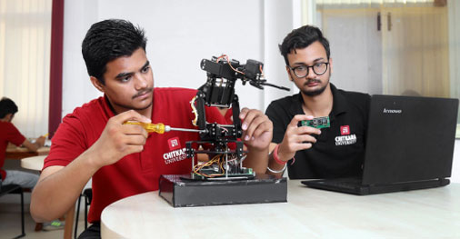 Students working on robotics and embedded systems in Electronics & Communication Engineering