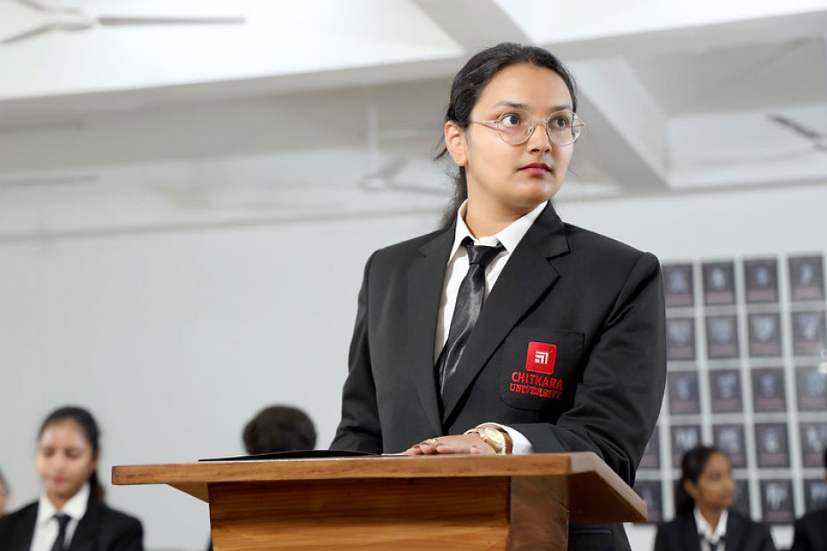 a ba llb student in the court room practicing law in the chitkara university's law classroom