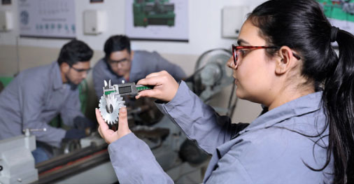 B.E. in Mechatronics Engineering students working on AI robotics projects