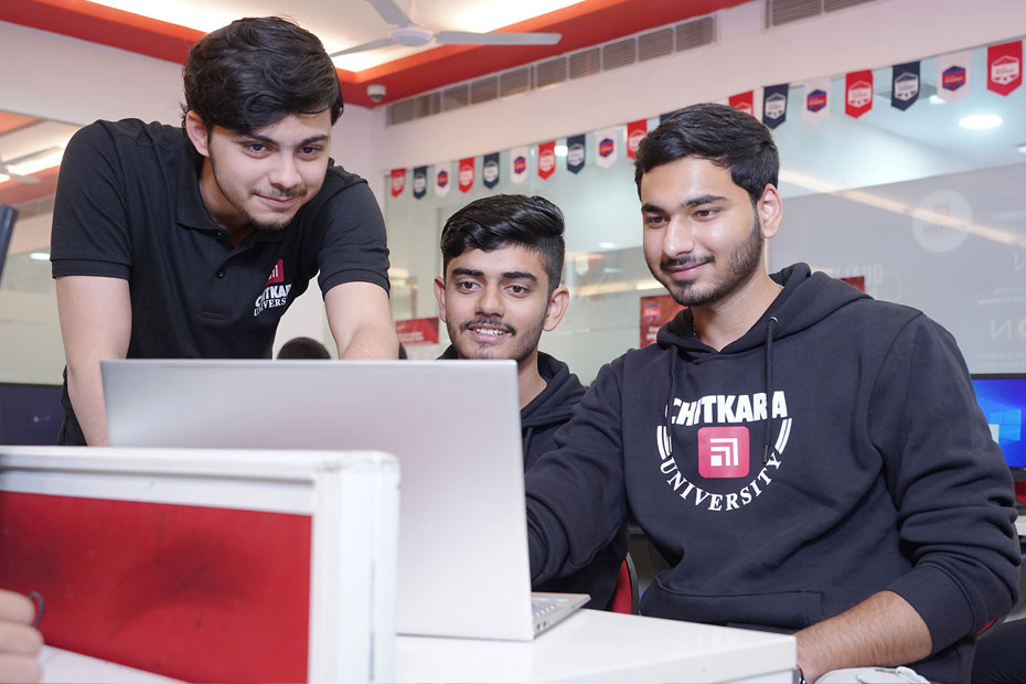 BCA program at Chitkara University with students learning programming and IT skills